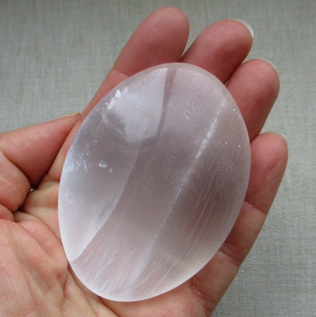 selenite palm stone